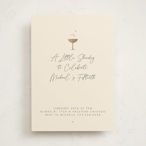 This is a champagne holiday party invitations with foil pressed by mo kelley called a little shindig printing on signature in standard