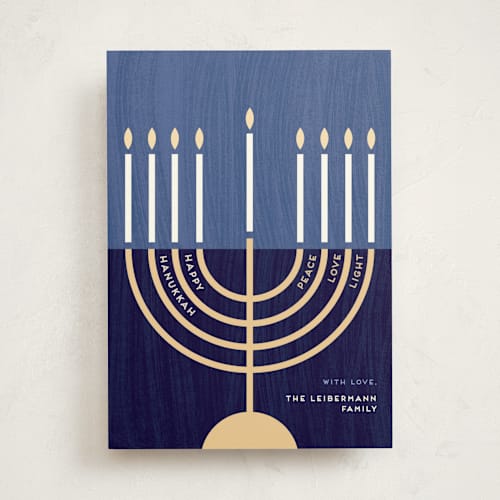 This is a navy hanukkah cards with standard by Kami Turnell called modern menorah printing on signature in standard