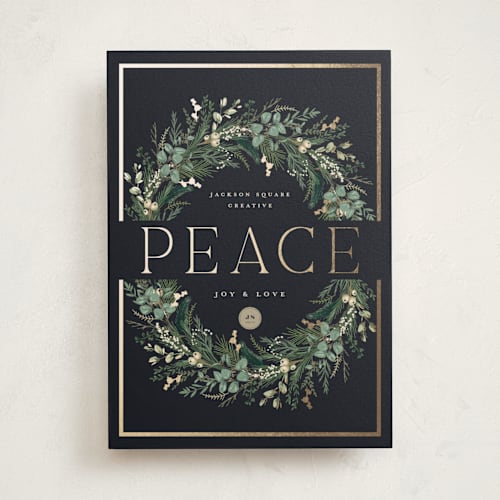 This is a juniper business holiday cards with foil pressed by Susan Moyal called peace on earth printing on signature in standard