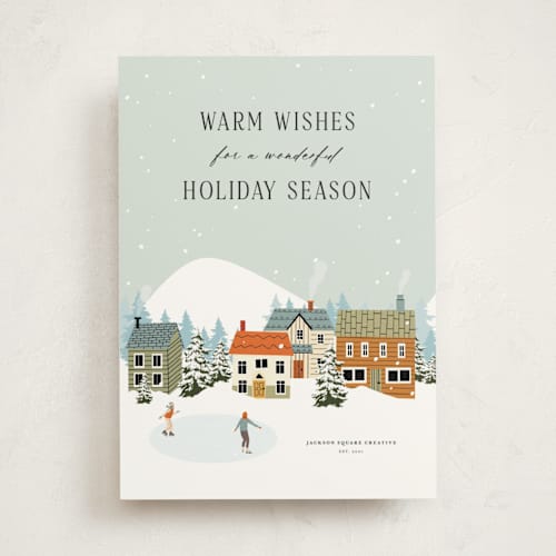 This is a blue spruce business holiday cards with standard by Sherley Ferreira called let it snow at the village printing on signature in standard