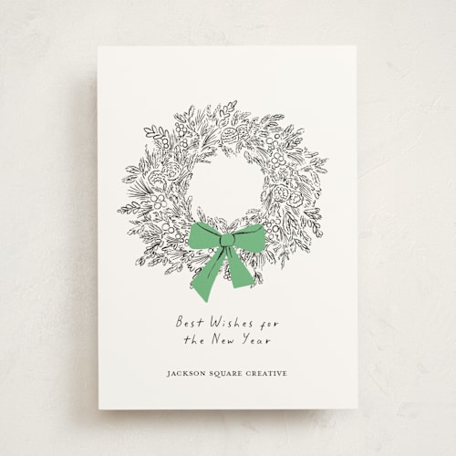 This is a greenery business holiday cards with standard by mo kelley called wreath with bow printing on signature in standard