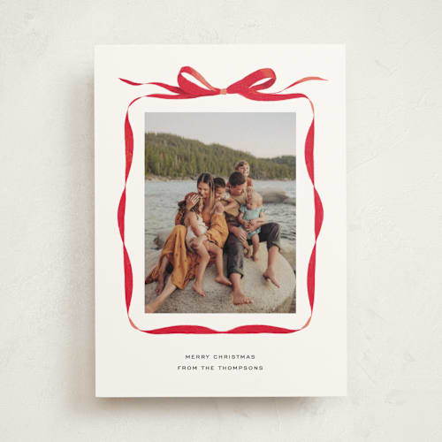 This is a crimson photo mount holiday cards with standard by Olivia Kanaley Inman called bow printing on party paper in photo_mount