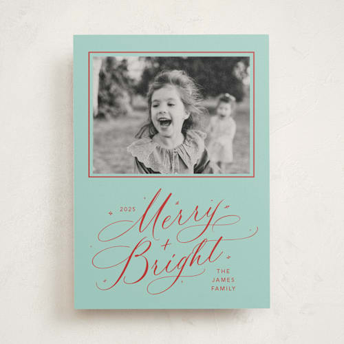 This is a turqouise photo mount holiday cards with standard by Erin Hodges called bright laughter printing on recycled in photo_mount