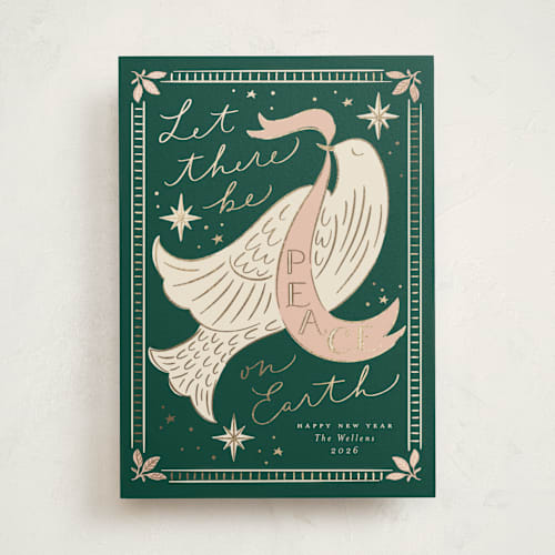 This is a evergreen foil pressed holiday cards with foil pressed by Erin German called peace on earth dove printing on signature in standard