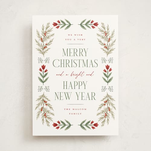 This is a pine non photo holiday cards with standard by Wildfield Paper Co called folk floral printing on signature in standard