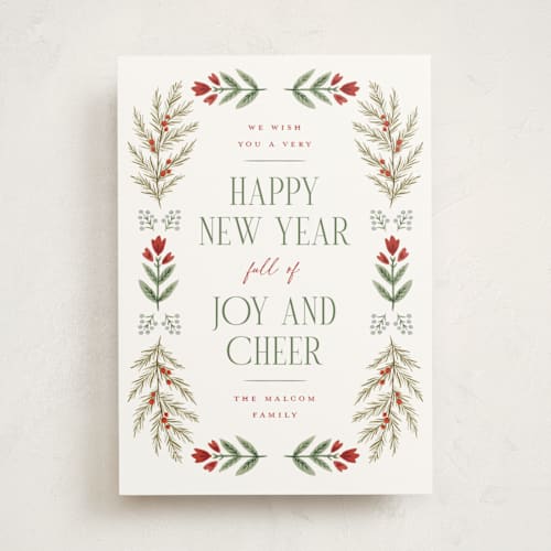 This is a pine non photo holiday cards with standard by Wildfield Paper Co called folk floral printing on signature in standard
