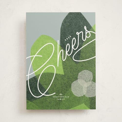This is a chartreuse non photo holiday cards with standard by Carrie Moradi called paper blooms printing on signature in standard