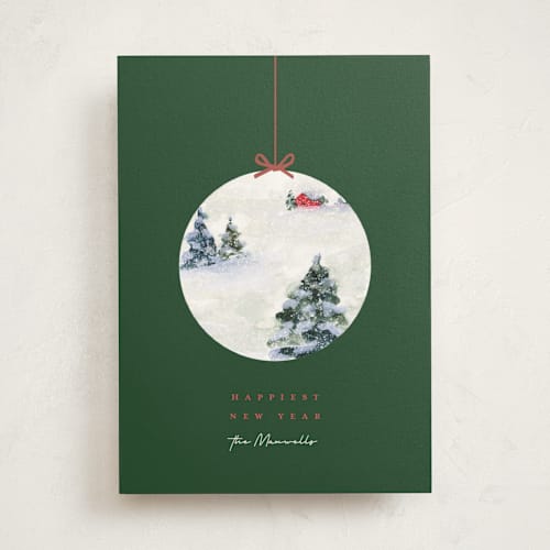 This is a fern non photo holiday cards with standard by Lindsay Megahed called snowy scene ornament printing on signature in standard