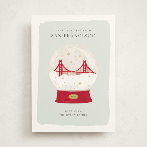 This is a juniper non photo holiday cards with standard by Laura Bercovich called golden gate globe printing on signature in standard