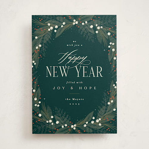 This is a pine non photo holiday cards with standard by Laura Hankins called charming wreath printing on signature in standard