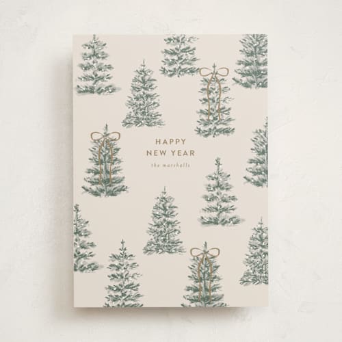 This is a champagne non photo holiday cards with standard by Angela Garrick called festive forest printing on signature in standard