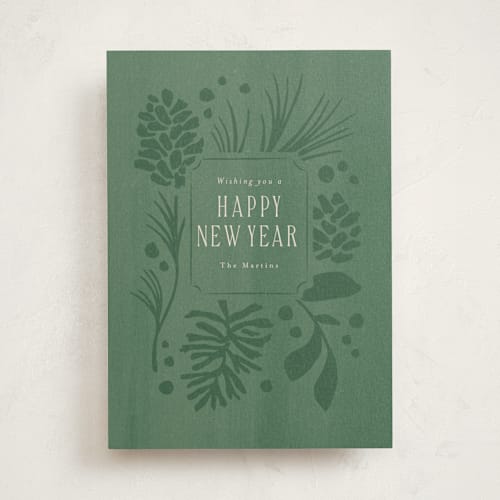 This is a wintergreen non photo holiday cards with standard by Jennifer Wick called pines and pinecones printing on signature in standard