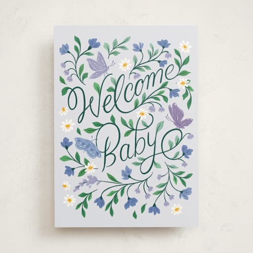 This is a powder blue new baby greeting cards with standard by Paper Raven Co. called welcome baby printing on signature in greeting cards