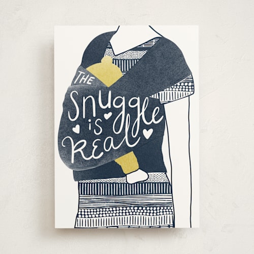 This is a navy new baby greeting cards with standard by Leanne Friedberg called snuggles printing on signature in greeting cards