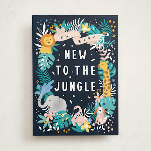 This is a navy new baby greeting cards with standard by Cindy Chu called new to the jungle printing on signature in greeting cards