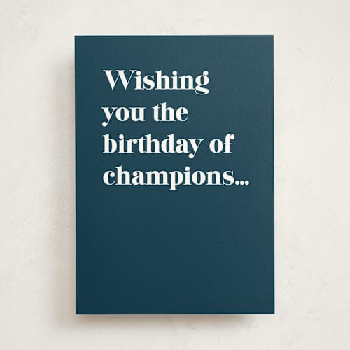 This is a navy birthday cards with standard by Snow and Ivy called champions printing on signature in greeting cards