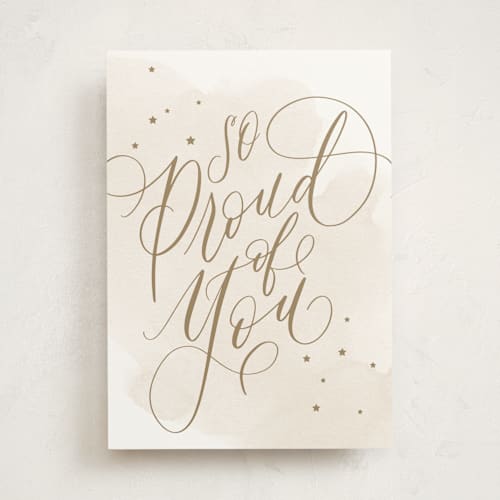 This is a biege congratulations cards with standard by Everett Paper Goods called so proud printing on signature in greeting cards