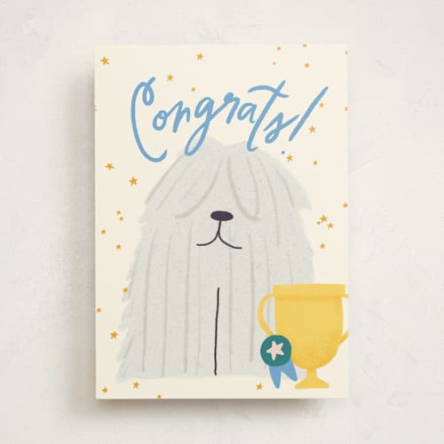 This is a beige congratulations cards with standard by Ana Peake called top dog printing on signature in greeting cards