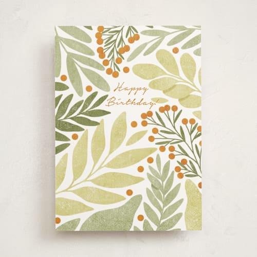 This is a greenery birthday cards for her with standard by Helga Wigandt called green leaves and orange berries printing on signature in greeting cards