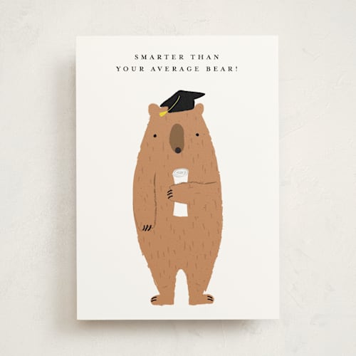 This is a cream graduation cards with standard by Angela Thompson called smart bear printing on signature in greeting cards