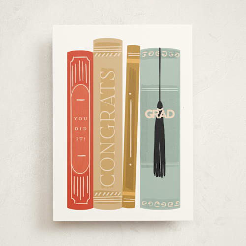 This is a book graduation cards with standard by Rebecca Durflinger called bookshelf printing on signature in greeting cards