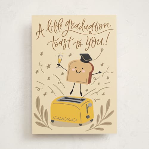 This is a butter graduation cards with standard by Yuliya Evseeva called pop the toast! printing on signature in greeting cards