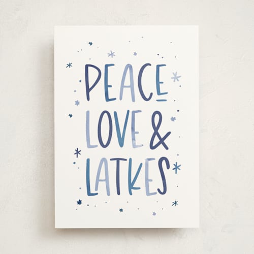 This is a frost greeting cards with standard by Laura Bercovich called peace, love & latkes printing on signature in greeting cards
