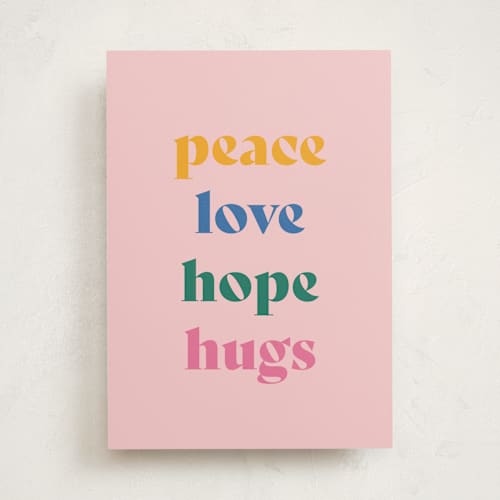 This is a blush greeting cards with standard by Owl and Toad called peace, love, hope, hugs printing on signature in greeting cards