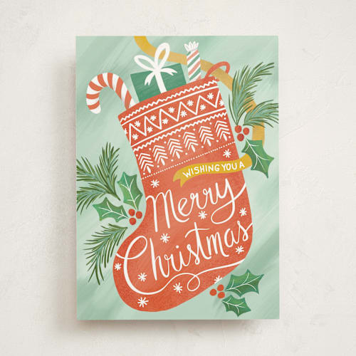 This is a mint greeting cards with standard by Blue Ombre co called stocking up for christmas printing on signature in greeting cards