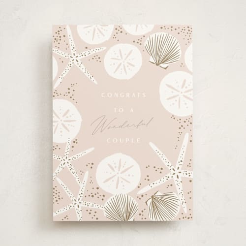 This is a champagne wedding cards with standard by Alethea and Ruth called seashell  printing on signature in greeting cards