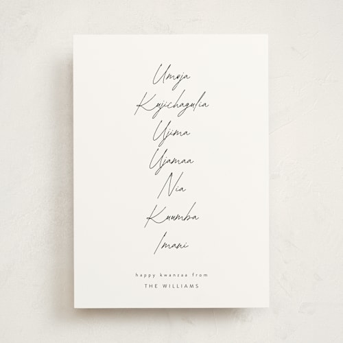 This is a ivory kwanzaa cards with standard by Tamara Hilje called seven principles printing on signature in standard