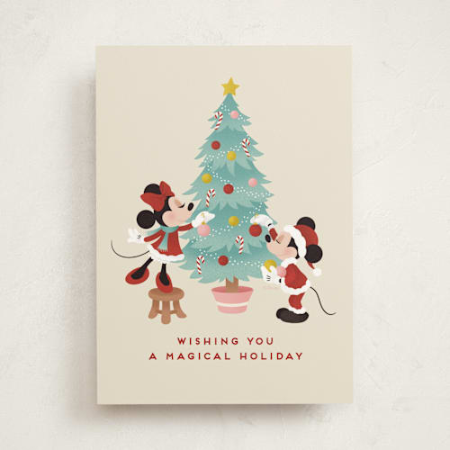 This is a sugar cookie tbd with standard by Jamie Alexander called disney's mickey and minnie trimming the tree printing on signature in greeting cards
