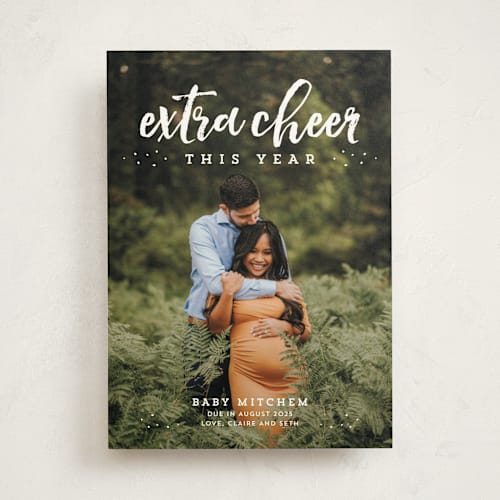 This is a cloud pregnancy announcements with standard by Lea Delaveris called extra cheer this year printing on signature in standard