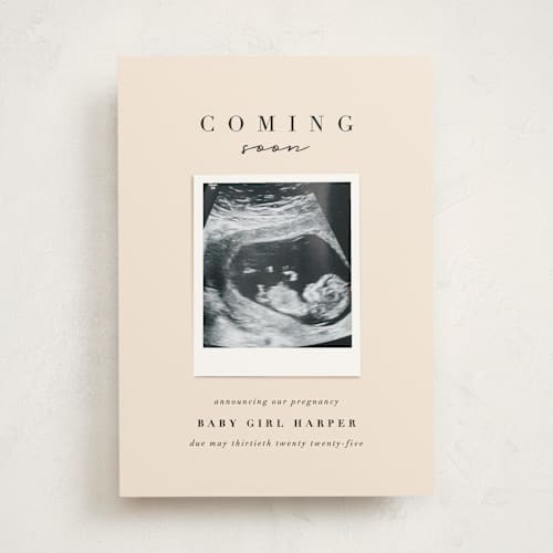 This is a peach pregnancy announcements with standard by Lori Wemple called coming soon snap printing on signature in standard