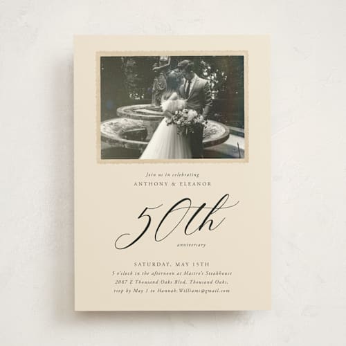 This is a golden party invitations with standard by Kamala Nahas called vintage photo printing on signature in standard