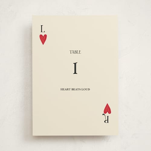 This is a champagne party table numbers with standard by Helena Vitto called red hearts printing on doublethick in standard