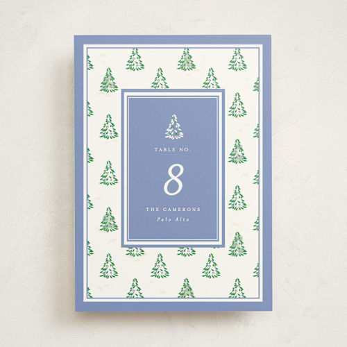 This is a provincial blue party table numbers with standard by Corinne Malesic called little trees printing on doublethick in standard