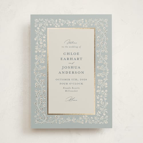 This is a something blue unique wedding programs with foil pressed by Gwen Bedat called floral romance printing on signature in folded