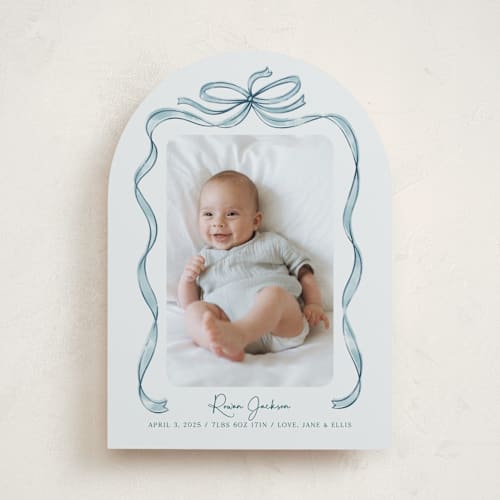 This is a mint birth announcements with standard by Paper Sun Studio called tied together printing on smooth signature in standard