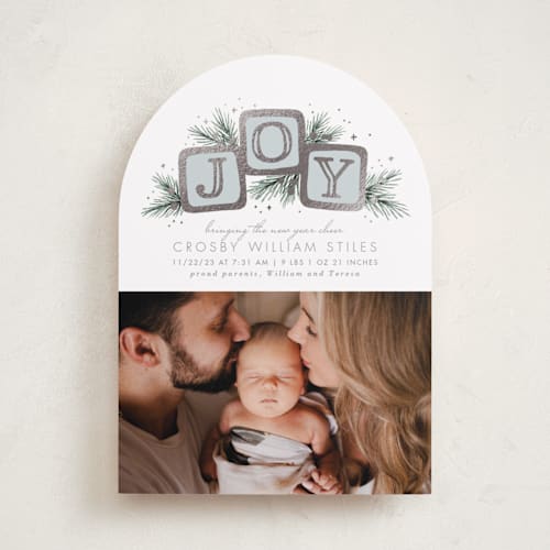 This is a robin’s egg babys first christmas with foil pressed by Laura Hankins called baby blocks printing on recycled smooth signature in standard