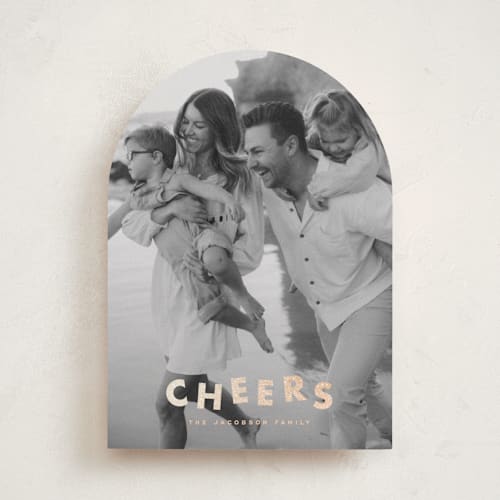 This is a champagne foil pressed holiday cards with foil pressed by Ellen Schlegelmilch called glitter cheers printing on recycled smooth signature in standard