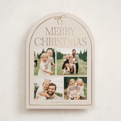 This is a buttercream foil pressed holiday cards with foil pressed by Vivian Yiwing called frame bow printing on recycled smooth signature in standard