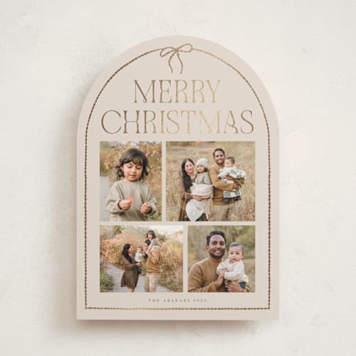 This is a buttercream foil pressed holiday cards with foil pressed by Vivian Yiwing called frame bow printing on recycled smooth signature in standard