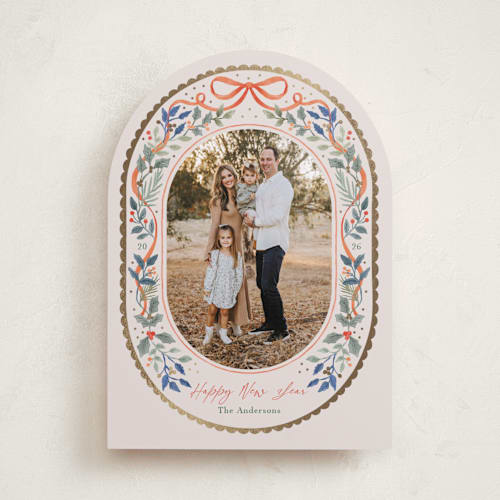 This is a holly foil pressed holiday cards with foil pressed by Elly called a gentle bow printing on recycled smooth signature in standard