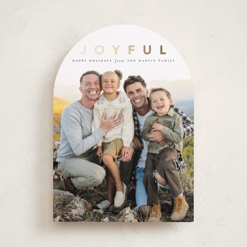 This is a coal foil pressed holiday cards with foil pressed by Laura Hamm called a joyful family printing on recycled smooth signature in standard