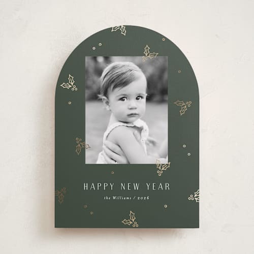 This is a evergreen foil pressed holiday cards with foil pressed by Michelle Taylor called jolly holly printing on recycled smooth signature in standard