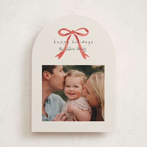This is a peppermint holiday photo cards with standard by Laura Hankins called painted bow printing on recycled smooth signature in standard