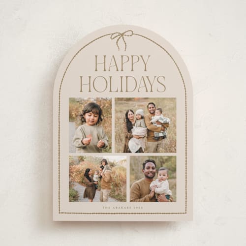 This is a buttercream holiday photo cards with standard by Vivian Yiwing called frame bow printing on recycled smooth signature in standard