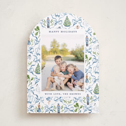 This is a blue ribbon holiday photo cards with standard by Sarah Knight called nutcracker ribbons printing on recycled smooth signature in standard