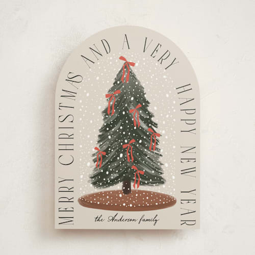 This is a buttercream non photo holiday cards with standard by Maja Cunningham called snowglobe printing on signature in standard